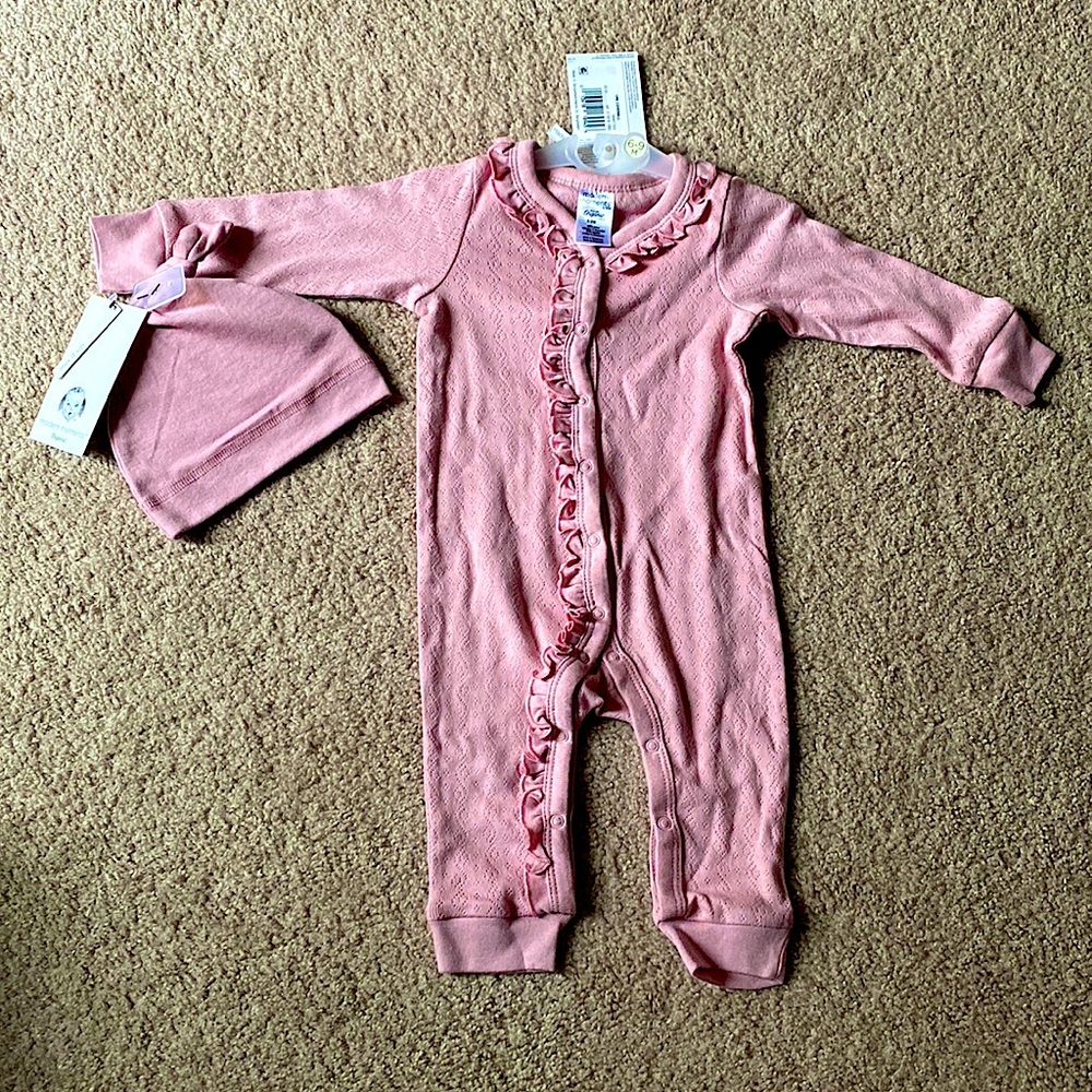 Gerber size 6-9 Months pink coverall type onesie. Long sleeve. NWT with hat